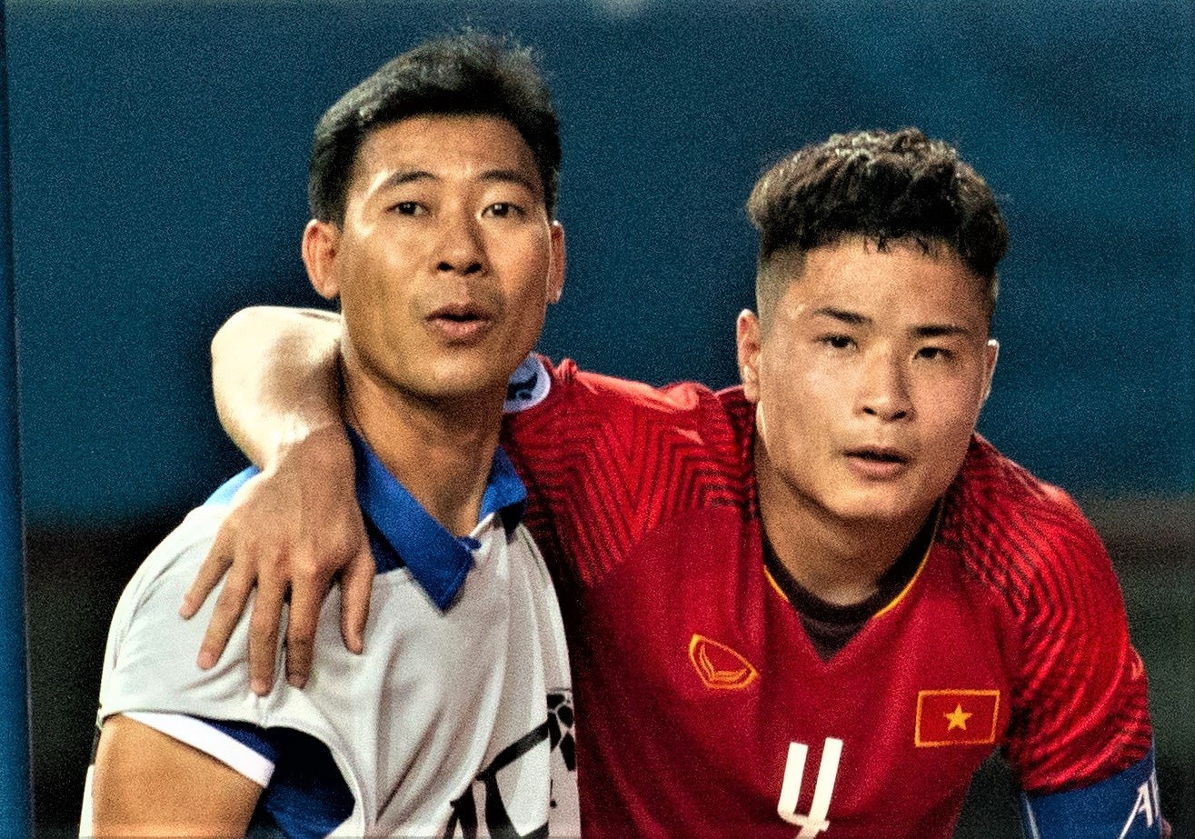 Trung ve Dang Van Toi rach co vai hinh anh