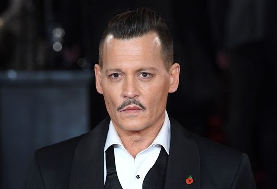 Johnny Depp phu nhan tan cong nhan vien doan phim hinh anh