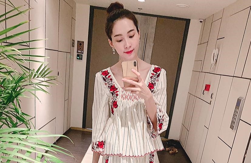 Dang Thu Thao tre trung, nu tinh voi vay hoa hinh anh