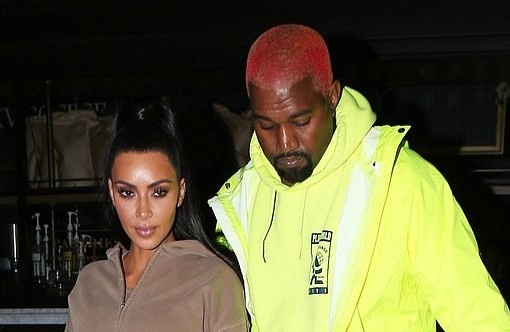 Vo chong Kim Kardashian bi chi trich vi thue may bay lon, gay o nhiem hinh anh