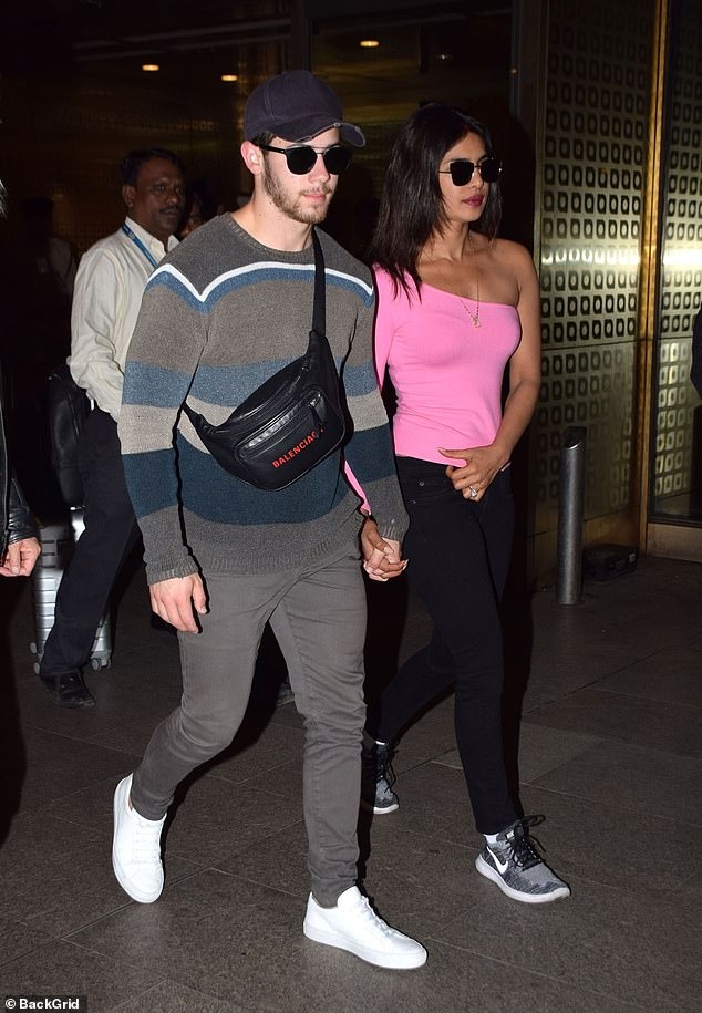 Vo chong Nick Jonas tro ve sau tuan trang mat anh 2