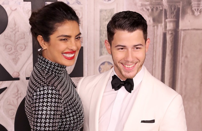 Nick Jonas muon co con som voi vo Hoa hau The gioi hinh anh
