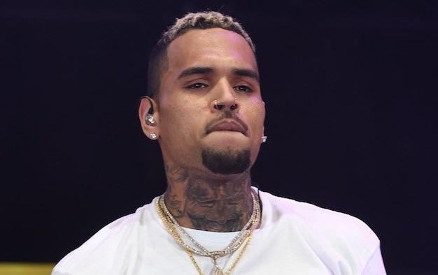 Chris Brown phu nhan cao buoc cuong hiep phu nu hinh anh