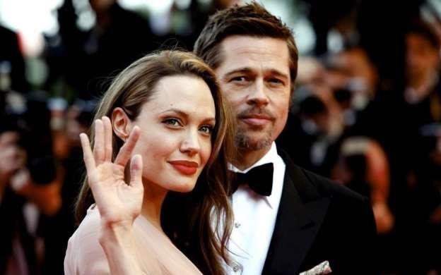 Angelina Jolie, Brad Pitt chinh thuc thanh nguoi doc than hinh anh