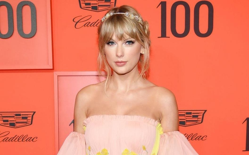 Taylor Swift va dan sao long lay tren tham do Time 100 hinh anh