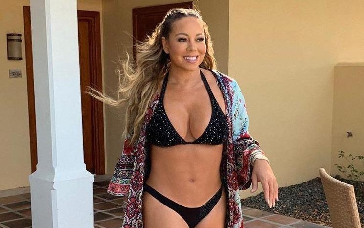 Mariah Carey nhan y kien trai chieu khi dang anh mac ao tam hai manh hinh anh