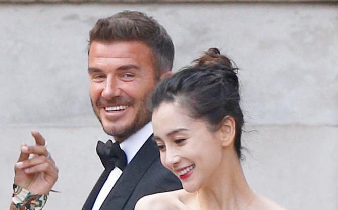 David Beckham va Angelababy cuoi tuoi khi quay quang cao tren pho hinh anh