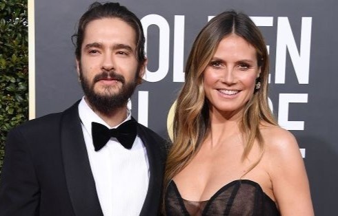 Heidi Klum hon ban trai qua cua kinh hinh anh