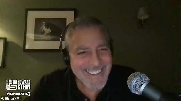 George Clooney giup vo giat do 7 lan moi ngay anh 1