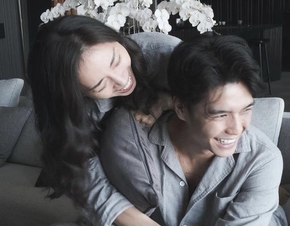 Thoi trang doi cua Ngo Thanh Van va Huy Tran hinh anh