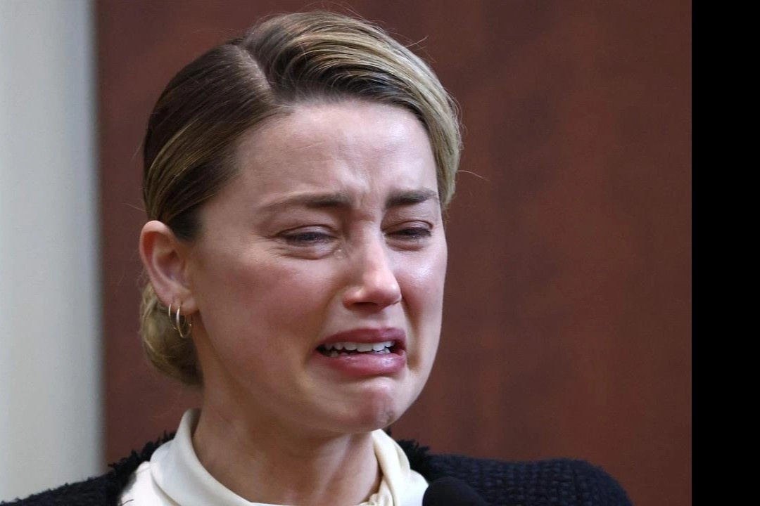 Johnny Depp kien Amber Heard anh 3