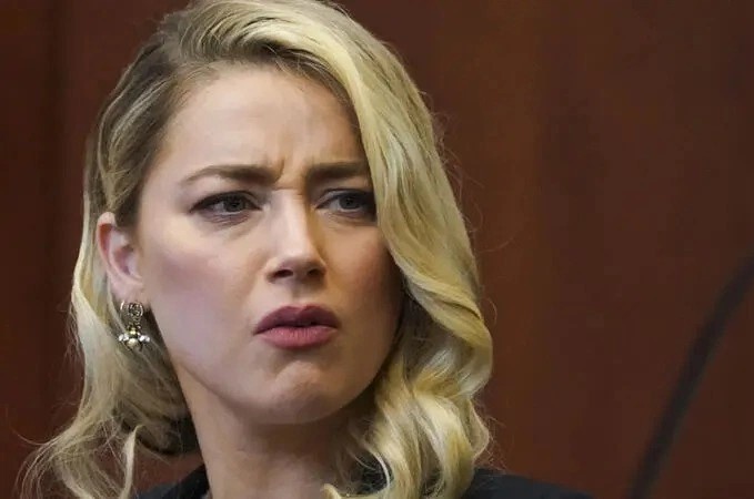 Nhan chung: 'Amber Heard mat 45 den 50 trieu USD vi Depp' hinh anh