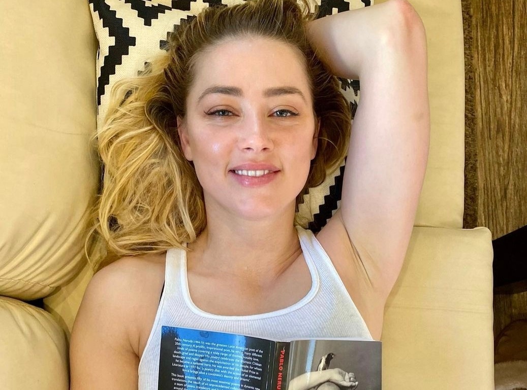 Amber Heard noi doi va he luy hinh anh