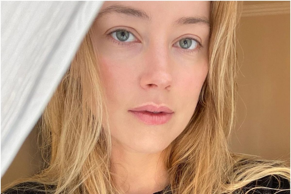 Amber Heard bi dieu tra vi khai man hinh anh