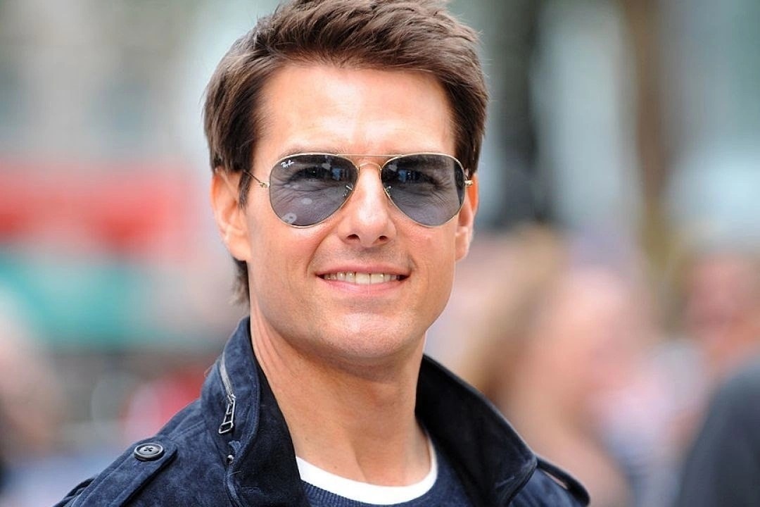 Tom Cruise nhay du tren vach nui, khong can dien vien dong the hinh anh