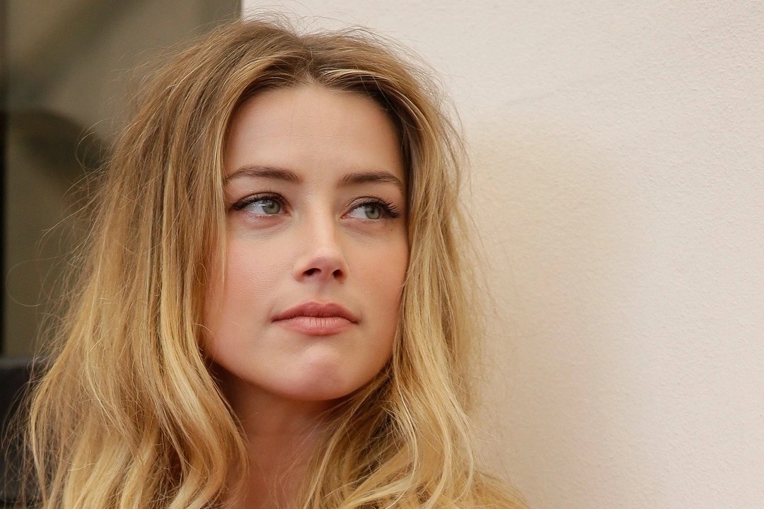 Amber Heard thue luat su moi de khang cao Johnny Depp hinh anh