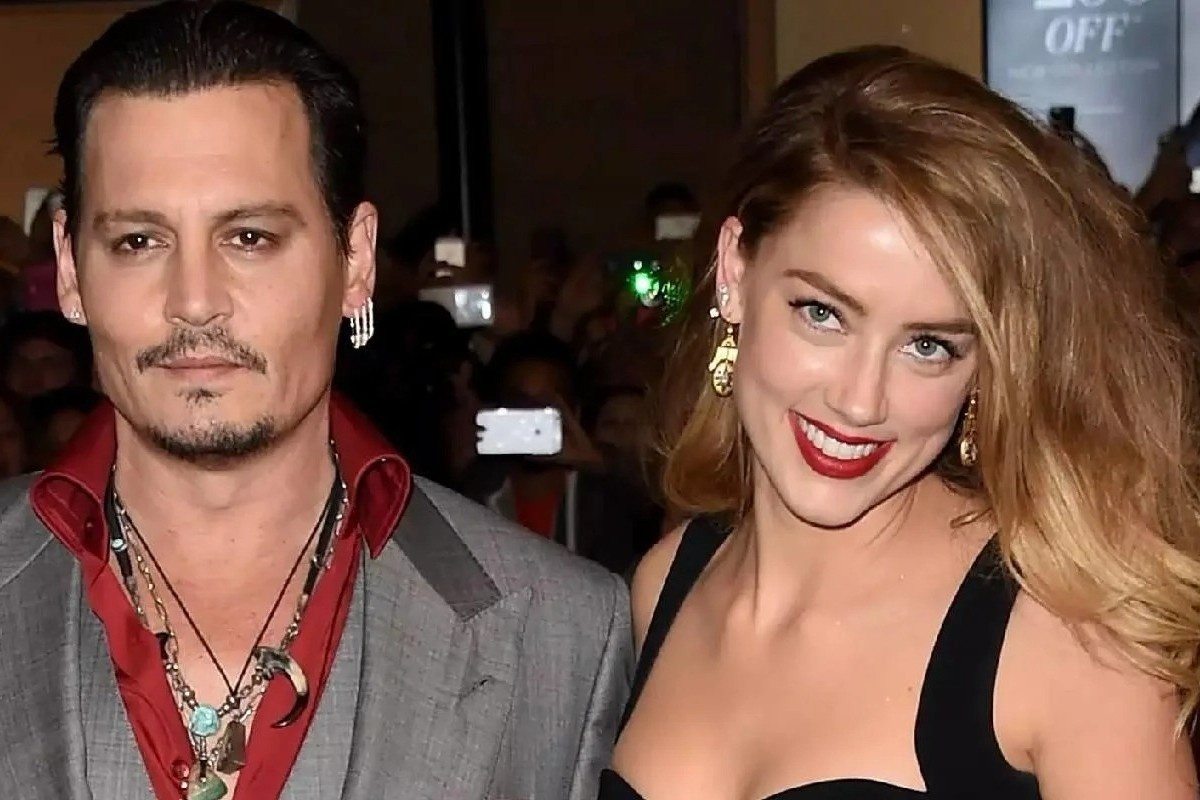 Amber Heard rut don khang cao Johnny Depp hinh anh