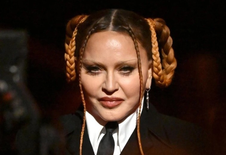 Guong mat cua Madonna gay ban tan hinh anh