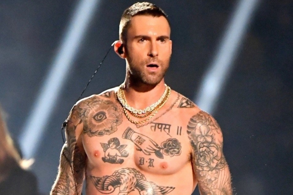 Adam Levine cam ket khong tiep tuc ngoai tinh hinh anh