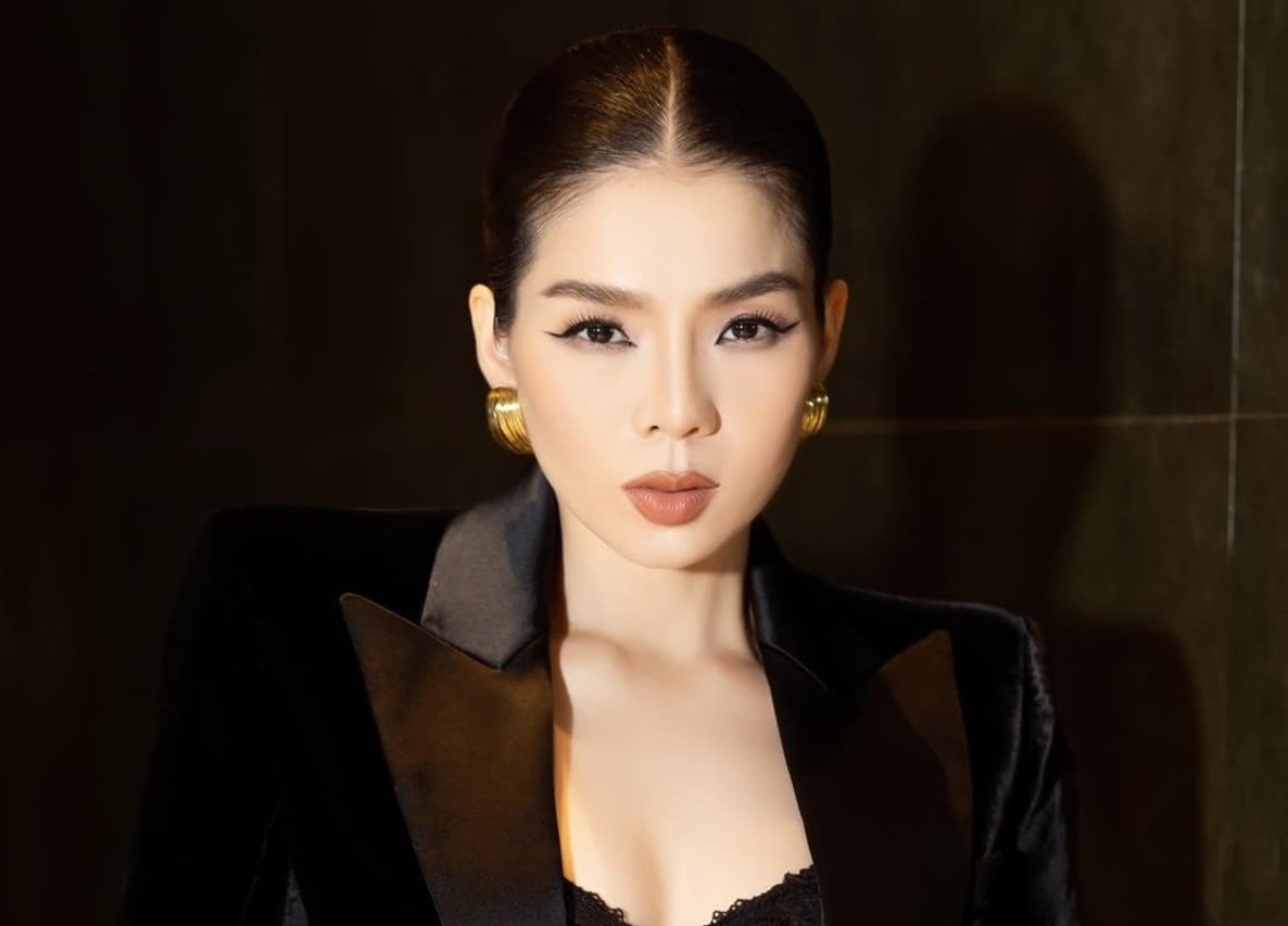 Le Quyen phan hoi nghi van mua binh chon o Chi dep hinh anh