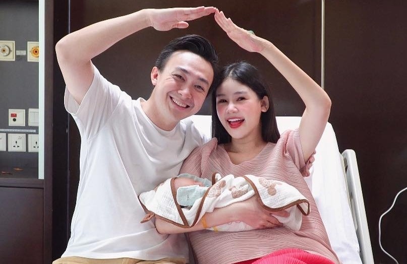 Le Au Ngan Anh sinh con dau long hinh anh