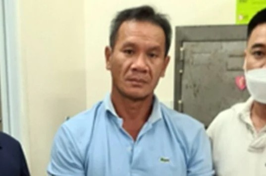 Nguoi tron truy na 13 nam sa luoi truoc giao thua hinh anh