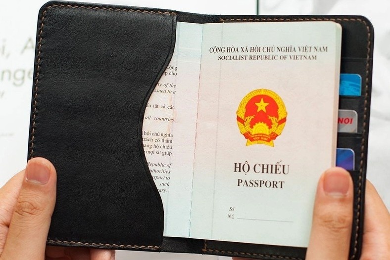 Xuat hien 'co moi' khi nguoi dan do xo di lam ho chieu o TP.HCM hinh anh