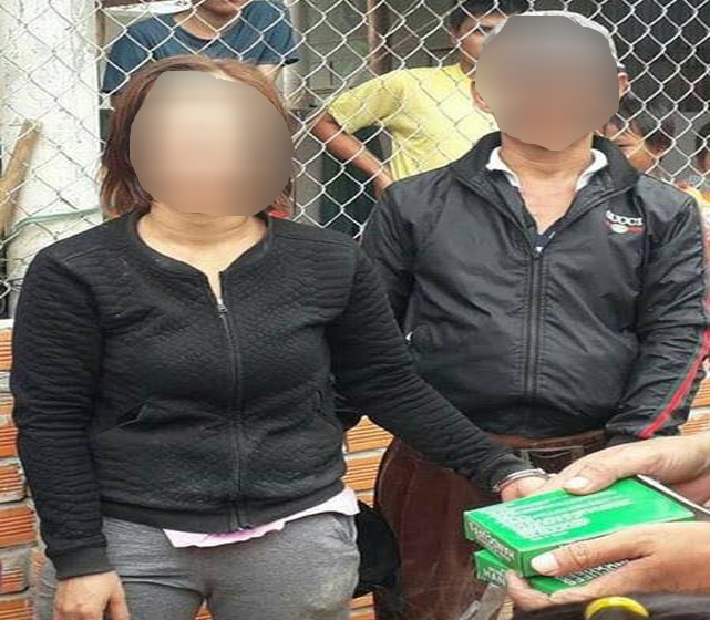 Vo chong di boc thuoc bi vay giu vi nghi bat coc tre em hinh anh