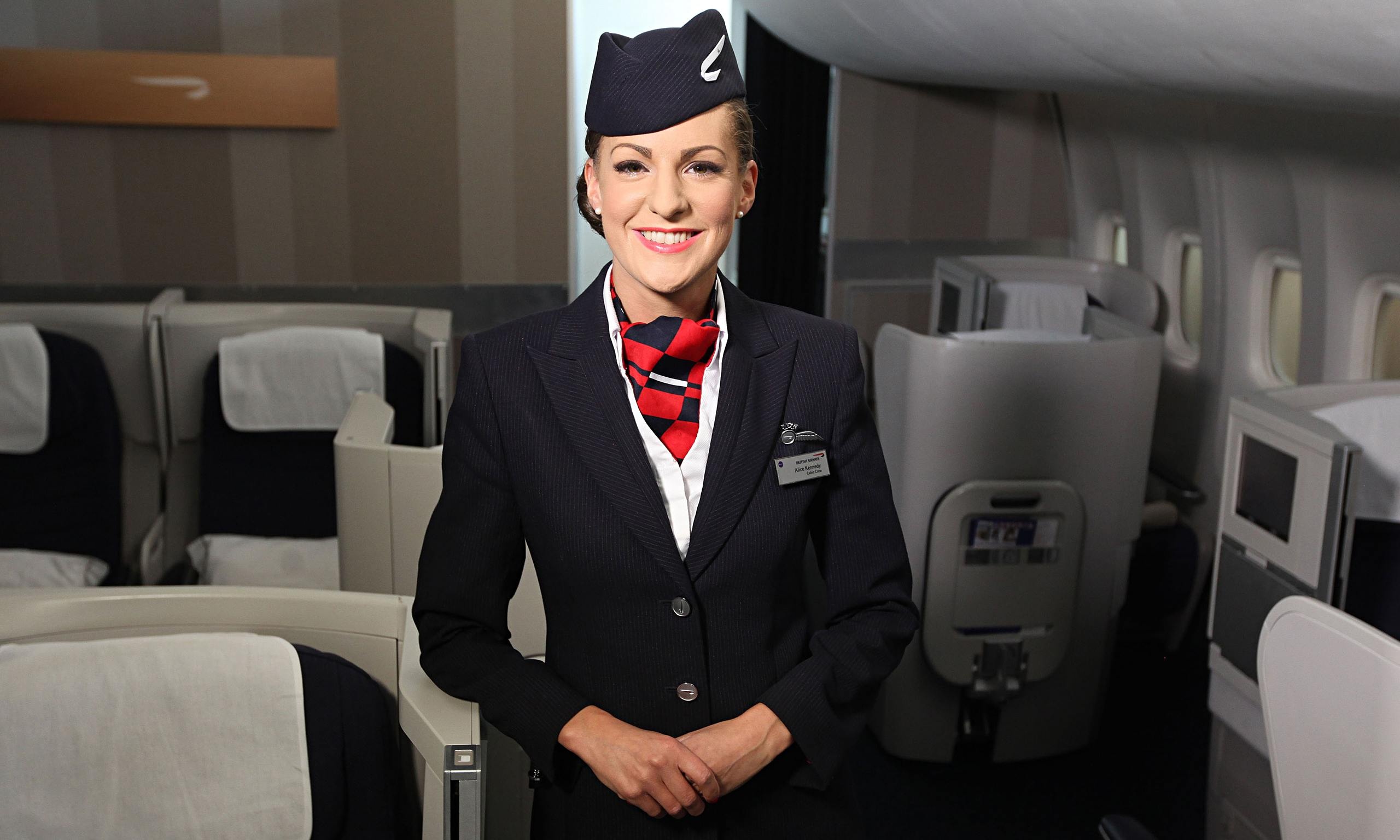 Một nữ tiếp viên hàng không của Bristish Airlines. Ảnh: Travelnews.com