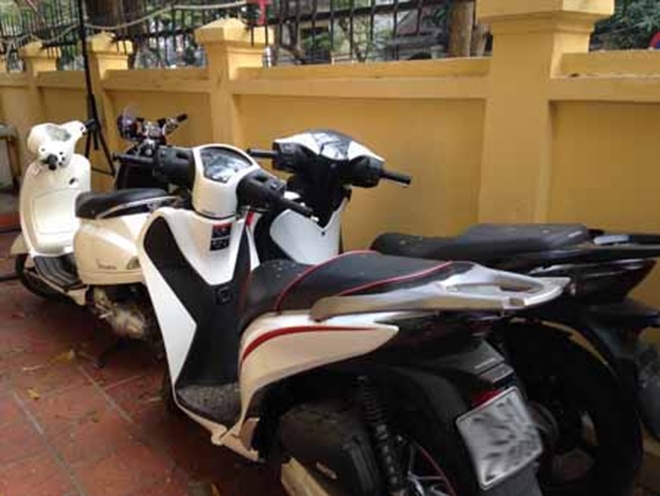 'Nhiep anh gia' giang bay gan chuc thieu nu lay xe tay ga hinh anh