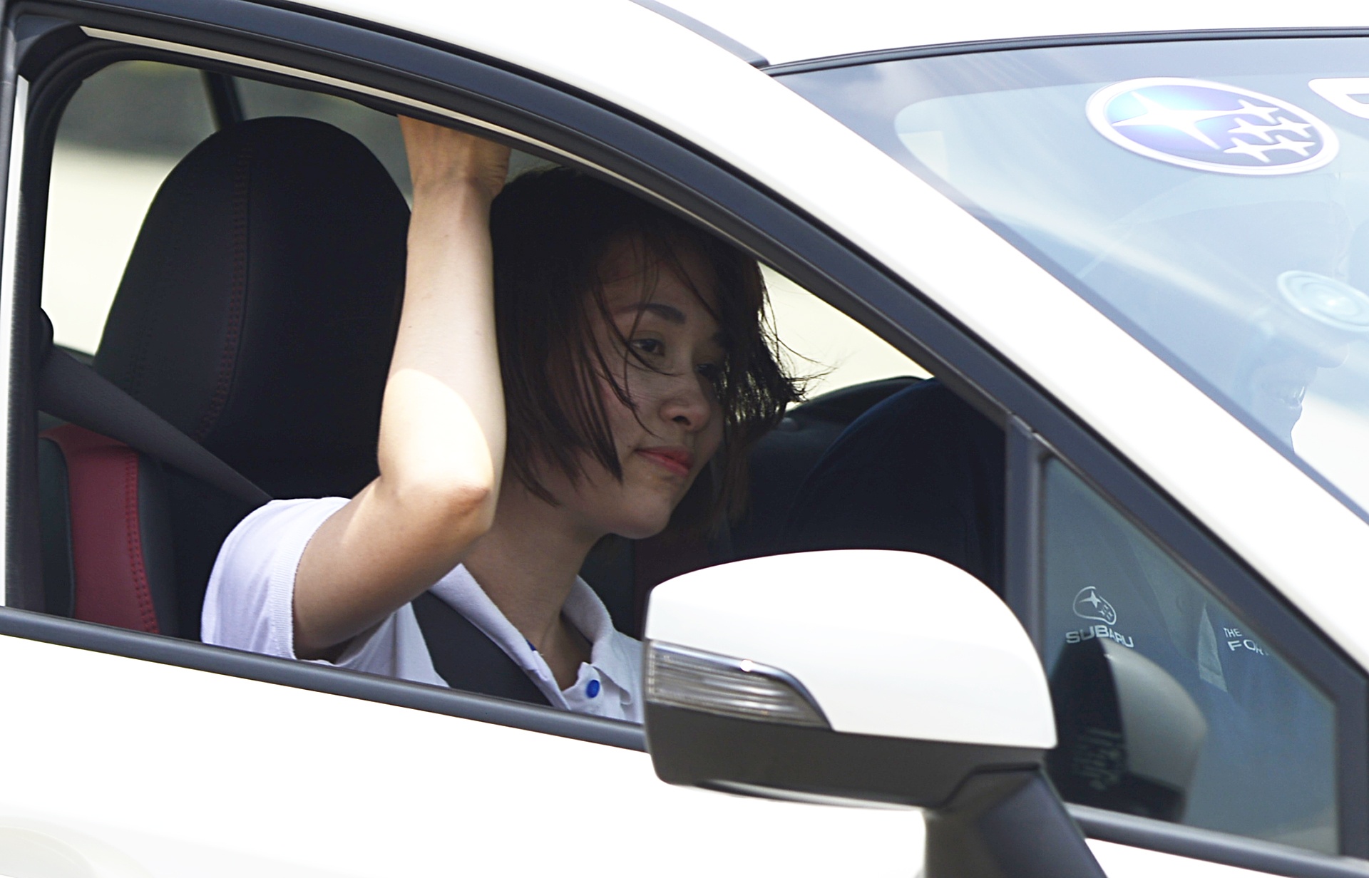 Russ Swift di xe o to bang hai banh o Ha Noi anh 12