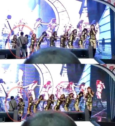 Trong một buổi biểu diễn hồi năm 2011, một người đàn ông lạ mặt đột nhiên kéo Taeyeon xuống sân khấu. Ảnh: seoulbeats