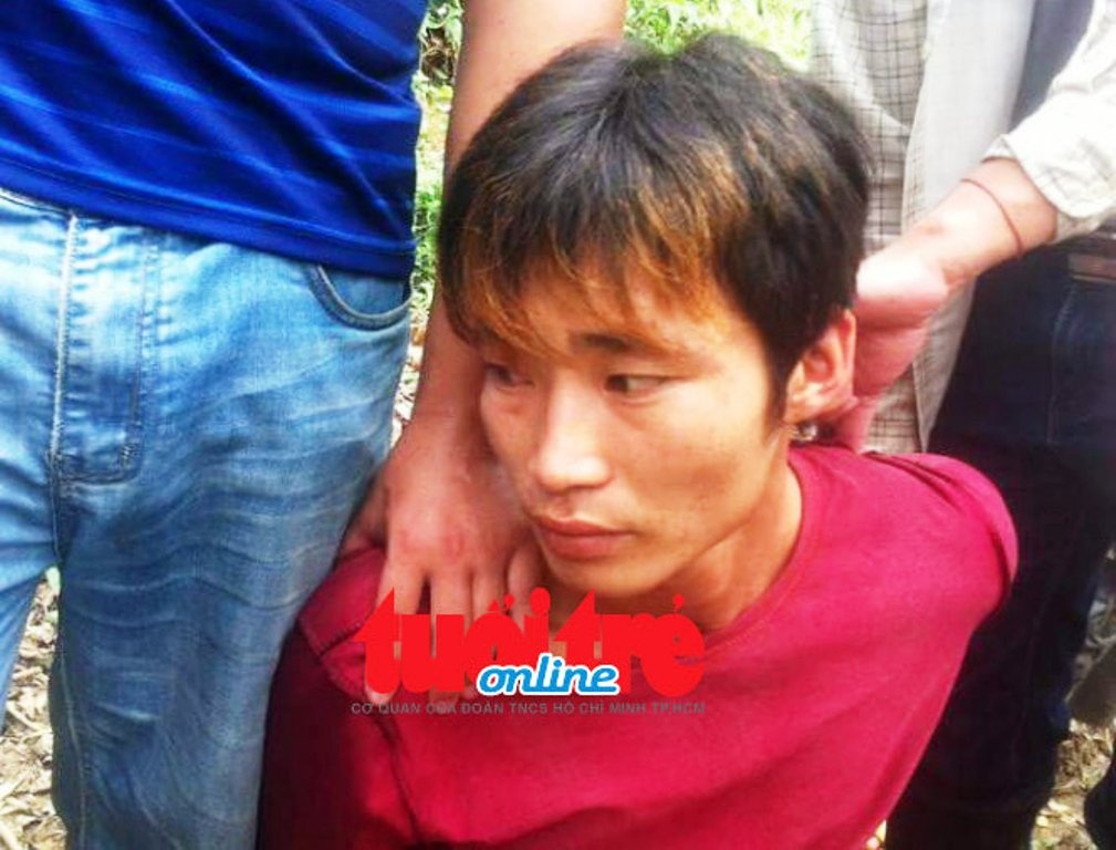Nghi phạm Đặng Văn hùng khi bị bắt.