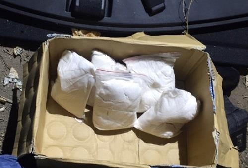 Bat 2 anh em mua 6 banh heroin tu Lao dua ve Viet Nam hinh anh