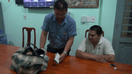 Chu quan com truc tiep tra 280 trieu cho khach bo quen hinh anh