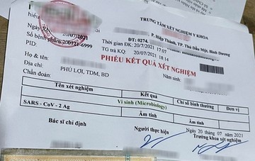 Khoi to them 3 nguoi trong vu lam gia giay xet nghiem Covid-19 hinh anh