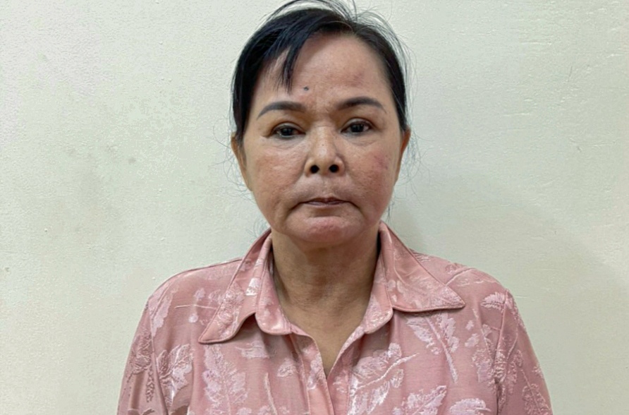 Bat giu nguoi phu nu tron truy na hon 20 nam hinh anh