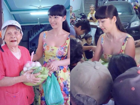 Le Kieu Nhu rang ro cung gia dinh phat qua Tet hinh anh