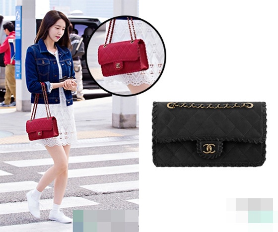 Chiếc túi màu đỏ là điểm nhấn cho set đồ của nữ ca sĩ. Đây là mẫu túi