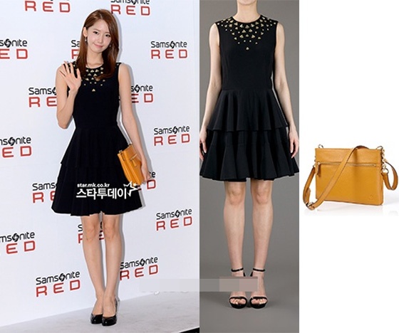 Với bộ váy đen, Yoona rất thông minh khi mix cùng túi vàng của Samsonitemall.