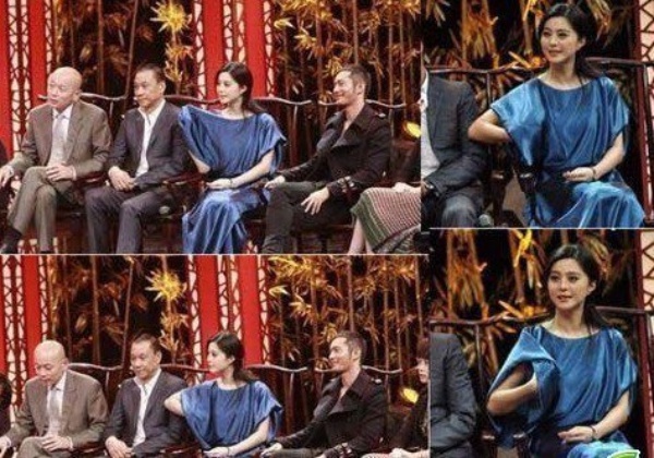 Trong buổi họp báo phim, Phạm Băng Băng vui vẻ đưa tay hẳn vào trong áo chỉnh trang phục.