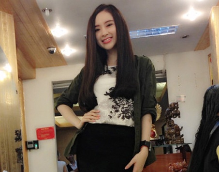 Angela Phuong Trinh ngoan hien voi toc moi hinh anh
