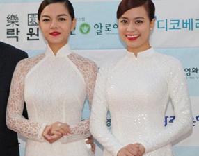 Hoang Thuy Linh, Quynh Anh dien ao dai tren tham do Han Quoc hinh anh