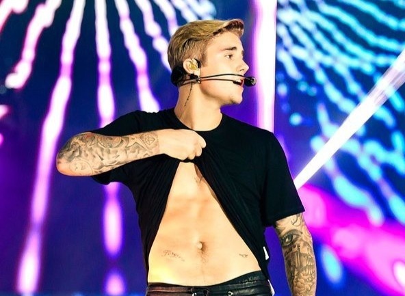 Justin Bieber lap ky luc o Billboard hinh anh