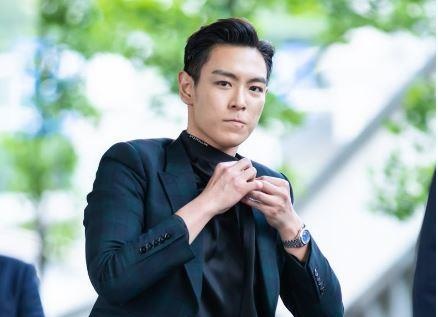 Ngay xuat ngu, T.O.P (Big Bang) duoc chao don tro lai hinh anh