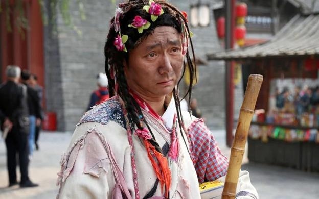 Chang trai Trung Quoc mua nha thanh pho sau 8 nam dong vai an xin hinh anh