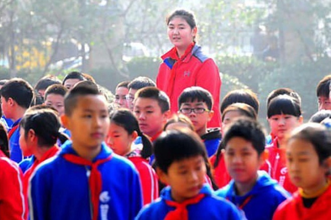 Am anh chieu cao, cha me Trung Quoc vo tinh hai con hinh anh