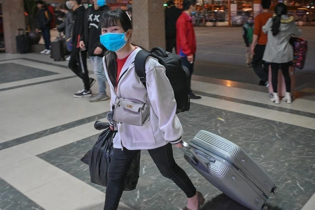 Khong mong thuong lon, chi can Tet duoc ve doan tu voi gia dinh hinh anh