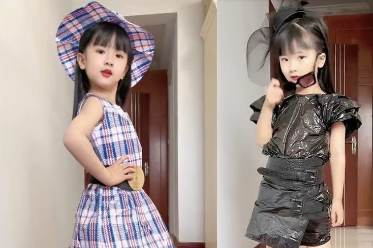 Nguoi me Trung Quoc cho con gai mac vay bang tui rac hinh anh