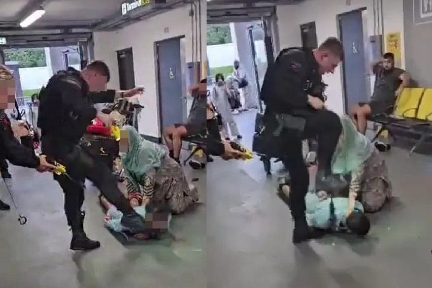 Canh sat Anh dap vao dau nguoi dan ong o san bay gay phan no hinh anh